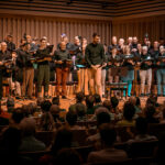 The choir The Sunday Boys performing on stage at the Stoller Hall